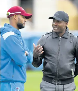  ?? PHOTO BY CWI MEDIA ?? Windies legend Brian Lara (right) in discussion with Windies batsman Shai Hope during a nets session at Lord’s Cricket Ground on September 6, 2017 in London, England.