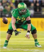  ?? ERIC EVANS/UNIVERSITY OF OREGON ?? Matt Hegarty (72) is shown in action for Oregon this season. The ex-Aztec High standout has one game left in his college career.