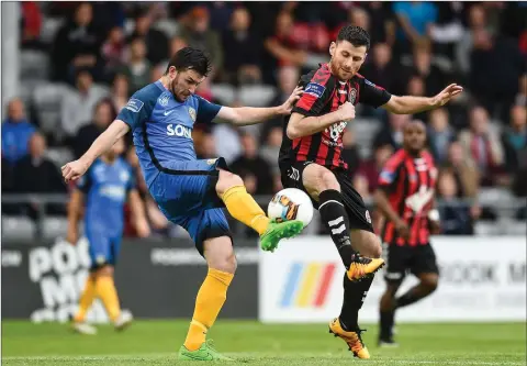  ??  ?? Bray’s Ryan Brennan wins this tussle with Dinny Corcoran of Bohemians.