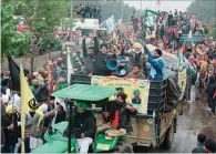  ?? (AFP) ?? Farmers shout slogans as they take part in a march to India’s capital New Delhi to protest against the central government’s recent agricultur­al reforms, in Ambala on Thursday.