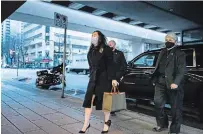  ?? DARRYL DYCK THE CANADIAN PRESS ?? Meng Wanzhou, chief financial officer of Huawei, arrives at B.C. Supreme Court, in Vancouver, on Tuesday.