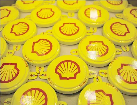  ?? ANDREY RUDAKOV / BLOOMBERG ?? Royal Dutch Shell announced late Monday that it would sell its 97.6 million shares in Canadian Natural Resources Ltd. The sale, though expected, sent shares in the Calgary-based oil major down four per cent early in the day before recovering somewhat.