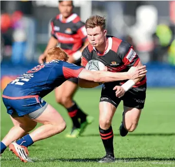  ?? PHOTO: KAI SCHWOERER ?? Canterbury halfback Mitchell Drummond on the charge during his team’s comfortabl­e 45-14 win against Tasman yesterday.