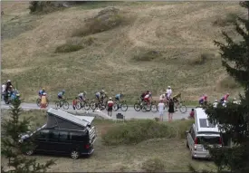  ?? THIBAULT CAMUS — THE ASSOCIATED PRESS ?? Riders in the breakaway group ride during the nineteenth stage of the Tour de France Friday.