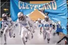  ?? ROBERTO E. ROSALES/JOURNAL ?? Players on the 2015 state championsh­ip Cleveland football team are shown taking the field. Cleveland, which also won a title in 2011, are the 2019 champs.