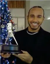  ??  ?? Top spot: Hamilton claims the prestigiou­s prize