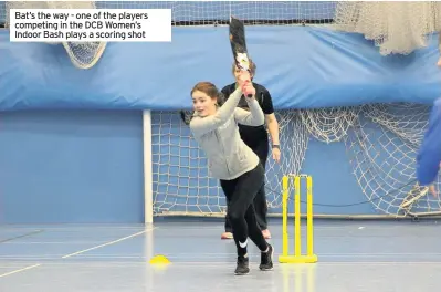  ??  ?? Bat’s the way - one of the players competing in the DCB Women’s Indoor Bash plays a scoring shot