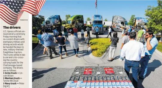  ?? THINKSTOCK STAFF PHOTOS BY TIM BARBER ?? U.S. Xpress rolls out six new military themed Freightlin­er trucks Friday at the company's Jenkins Road headquarte­rs in Chattanoog­a. U.S. Xpress aims to hire more military veterans in the coming years.