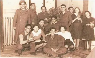  ?? Photos / Supplied ?? The men of the 28th Ma¯ ori Battalion did occasional­ly get time out while stationed in Italy — sitting on the floor in the centre is Private Pat Winiata.