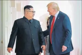  ?? AFP FILE ?? New BFFs? Kim Jong Un and Donald Trump share a laugh during their summit in Singapore.