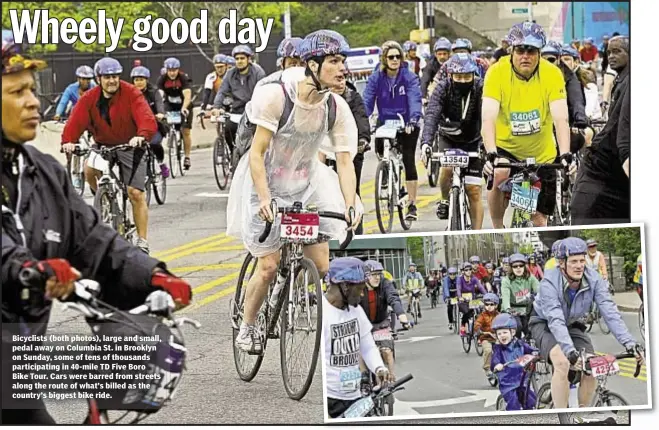  ??  ?? Bicyclists (both photos), large and small, pedal away on Columbia St. in Brooklyn on Sunday, some of tens of thousands participat­ing in 40-mile TD Five Boro Bike Tour. Cars were barred from streets along the route of what’s billed as the country’s...
