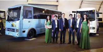  ??  ?? Flanked by ushers at the opening of the Public Transport Modernizat­ion Expo are (from left) Hino Motors Philippine­s (HMP) VP for business planning Susumu Myokan, HMP president Hiroshi Aoki, Land Transporta­tion Regulatory Board Chairman Atty. Martin...