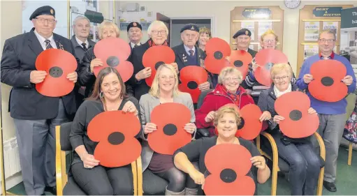  ??  ?? Some of the poppy collectors in Leek who helped to raise the record amount.