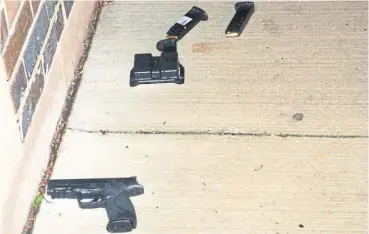  ?? SPECIAL INVESTIGAT­IONS UNIT ?? A Smith and Wesson .40-calibre handgun, two magazines and a magazine holder were found next to Hussain’s body.