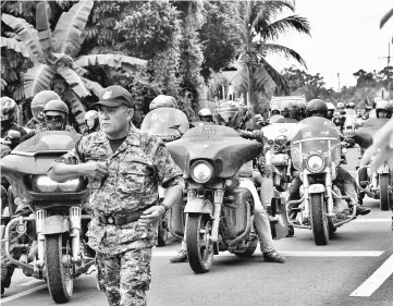  ??  ?? The riders arrive at Rumah Dieo.