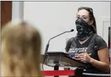  ?? THE ASSOCIATED PRESS ?? Jenna Hague speaks at the Broward School Board’s emergency meeting, Wednesday, July 28, 2021, in Fort Lauderdale, Fla. The board listened to parents’ concerns and will make a decision regarding the use of masks for K-12students in the upcoming school year.