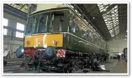  ?? PAUL CLIFTON. ?? Class 121 ‘Bubble car’ 55028 inside Eastleigh Works. The former South West Trains vehicle will work with the railway’s three-car Class 117, but also requires wheelsets before it can operate main line services.