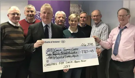  ??  ?? The Christmas Day Splash at Rosses Point was a huge success with thanks to local community. Pauric Oates presents cheque to Board of Directors at Sligo Cancer Support Centre for €7,747.03. Absent from photo – Declan Byrne.