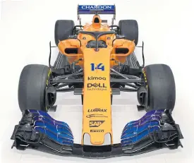  ??  ?? McLaren show their new MCL33 racing car for the season.