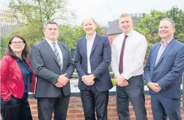  ??  ?? >
From left: Terri Halstead, from Haines Watts, Matt Long, from Calthorpe Estates, and Darren Holdway, Kevin Hodgetts and Andrew Jones, all from Haines Watts, at the firm’s new offices in Greenfield Crescent, Edgbaston