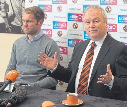  ?? Picture: SNS. ?? New Dundee United manager Robbie Neilson speaks to the media with United chairman Mike Martin, right.