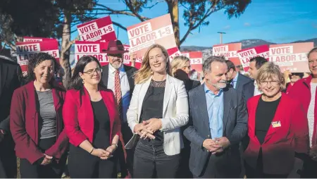  ?? ?? Labor leader Rebecca White with candidates and volunteers the day before the 2021 Tasmanian state election.