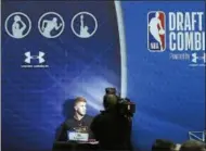  ?? CHARLES REX ARBOGAST - ASSOCIATED PRESS ?? Kevin Huerter, from Maryland, is interviewe­d during the NBA draft basketball combine Friday in Chicago.