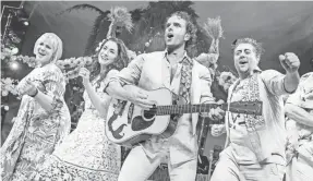  ?? MATTHEW MURPHY ?? Lisa Howard, left, Alison Luff, Paul Alexander Nolan and Eric Petersen bring zest to Jimmy Buffett’s “Escape to Margaritav­ille,” now playing at Broadway’s Marquis Theatre.