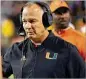  ??  ?? Miami coach Mark Richt could watch a former four-star QB recruit out of Central Gwinnett High transfer to another school.