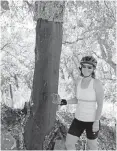  ??  ?? Left: Delicious Spanish jamon iberico in the making. Right: Roseanne Sovka with a cork oak, stripped of its cork bark, which will regrow over the next seven years.