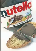  ?? [GIUSEPPE ARESU/BLOOMBERG] ?? A French supermarke­t chain discounted Nutella by 70 percent.
