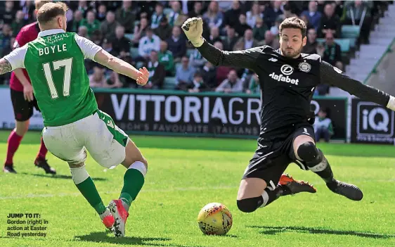  ??  ?? JUMP TO IT: Gordon (right) in action at Easter Road yesterday