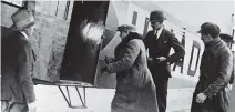  ?? ?? TYCOON: Alfred Loewenstei­n, right, and, above, boarding one of his private aircraft. He fell to his death over the Channel in 1928 – why has not been explained