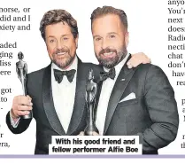  ?? ?? With his good friend and fellow performer Alfie Boe