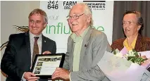  ??  ?? William Rolleston says farmers have engaged with environmen­tal issues during his tenure as president. As vice-president he presented environmen­tal pioneers Gordon and Celia Stephenson with their Federated Farmers life membership.