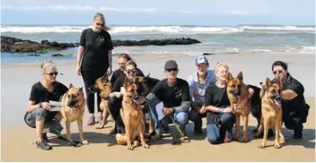  ?? Picture: SIPHOKAZI VUSO ?? BEACH TIME: German Federation East London members supported Pet Pals’s fourth annual dog walk that took place along the beach