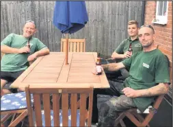  ??  ?? ■ Robb Knapp, John McReynolds and Will Breward from Knappster Landscapes who have stepped in to reconstruc­t a garden for Mountsorre­l’s Matty Hatton,15, who has an untreatabl­e brain tumour.