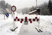  ?? KARL-JOSEF HILDENBRAN­D AP ?? Because of the danger of an avalanche, a mountain pass road was closed in Obermaisel­stein, Germany on Sunday.