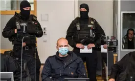  ??  ?? The defendant, Stephan Balliet, arriving for the first day of his trial for murder at the courthouse in Magdeburg. Photograph: Jens Schlueter/EPA