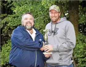  ?? SUBMITTED PHOTO - CARL HESS ?? Topping the car class was Clint Baker of Bethel, right, with his 1969 Ford Mustang. Presenting the award is Tom DeLancey, left, property manager at Appalachia­n RV Resort.