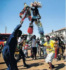  ?? Picture: Reuters ?? Supporters of President Emmerson Mnangagwa’s ruling Zanu-PF party celebrate his election victory in Harare.