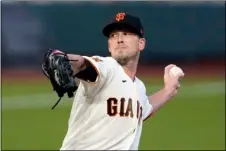  ?? AP PHOTO/JEFF CHIU ?? San Francisco Giants’ Drew Smyly throws against the Seattle Mariners during a baseball game in San Francisco, Sept. 16.