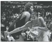  ?? AP/JESSICA HILL ?? The Connecticu­t Sun’s Alyssa Thomas (front) drives past Washington Mystics’ Tianna Hawkins during the first half Tuesday in Game 4 of the WNBA Finals in Uncasville, Conn.