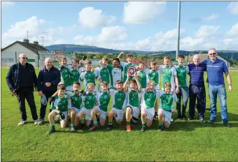  ??  ?? Clara Gaels celebrate after their victory over Clan na Gael in Rathnew.