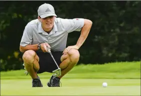  ?? DANA JENSEN/THE DAY ?? Holden Sullivan lines up a putt during Saturday’s 97th Norwich Invitation­al championsh­ip flight final at Norwich Golf Course. Sullivan lost to Chris DeLucia, 4 and 3.