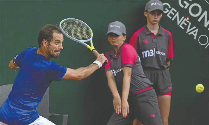  ?? ?? France's Richard Gasquet returns a ball to Russia's Daniil Medvedev during the ATP 250 Geneva Open tennis tournament in Geneva on Tuesday. — Getty Images