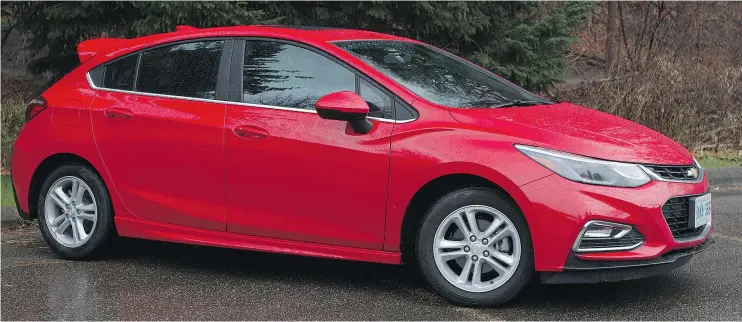  ?? — PHOTOS: CLAYTON SEAMS/DRIVING.CA ?? The 2017 Chevrolet Cruze Hatchback has a completely flat load floor behind the rear seats, doing wonders for storage.