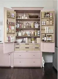  ??  ?? Below Take colour inspiratio­n from manufactur­ers such as Neptune’s soft lilac pink cupboard