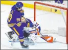  ?? The Associated Press ?? Jeffrey T. Barnes
Alex Tuch scores the decisive shootout goal on Oilers goalie Stuart Skinner in the Sabres’ 3-2 victory at Keybank Center.