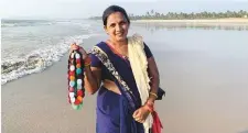  ?? AP ?? Right below: Seema Rajgarh, a jewellery hawker, at Utorda beach.